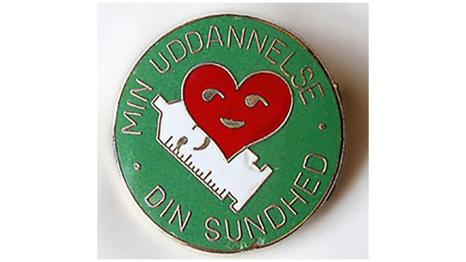 Badge fra kampagnen for en bedre uddannelse 1976